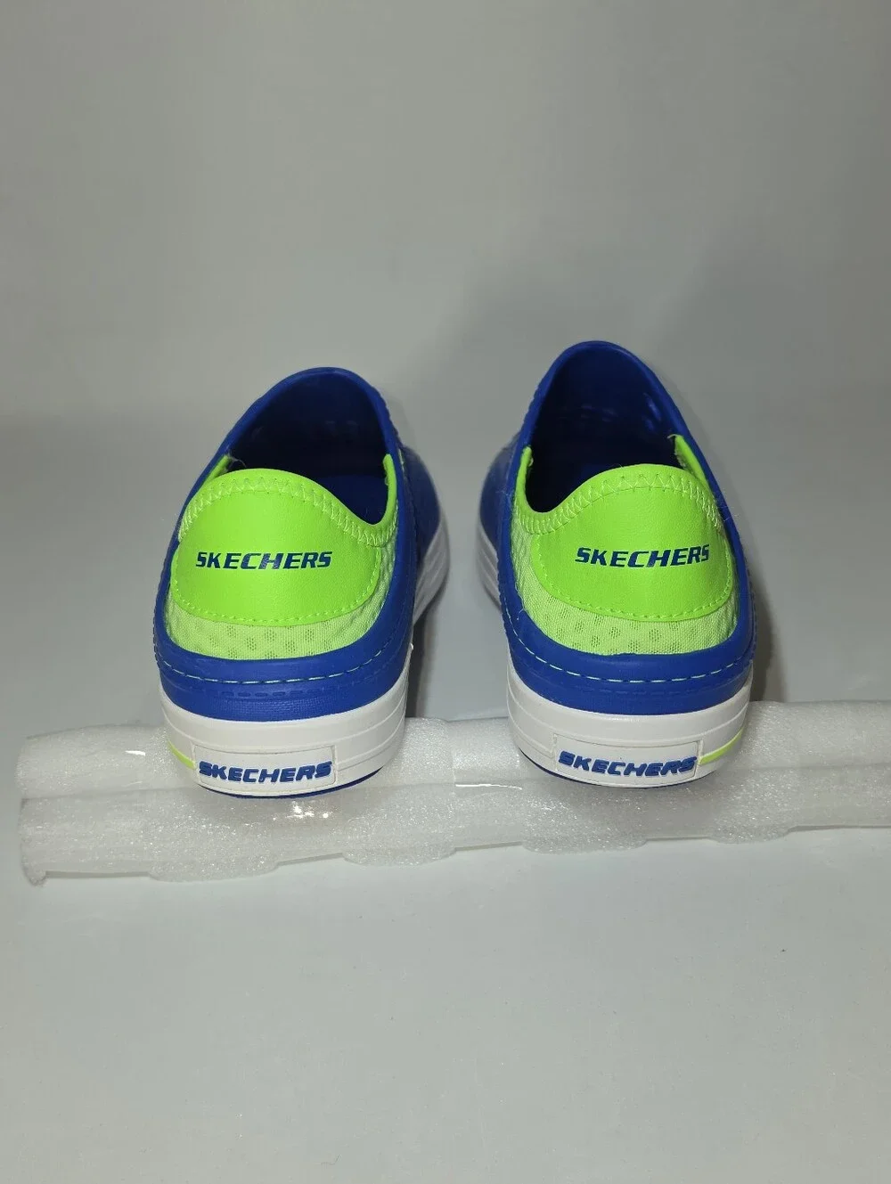Skechers Kids Blue Slip-On Sandals with Neon Green Lining